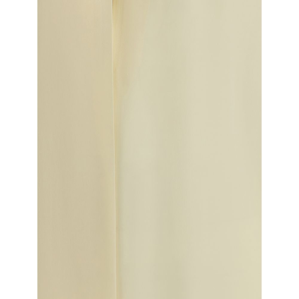 Close-up of the luxurious fabric of the Tom Ford Cream Silk Blouse, showcasing its elegant and refined design for special occasions.