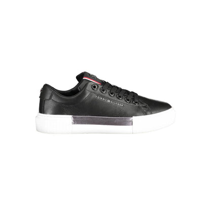 Tommy Hilfiger Black Leather Women Sneaker with contrasting white sole and iconic logo for sporty chic style.