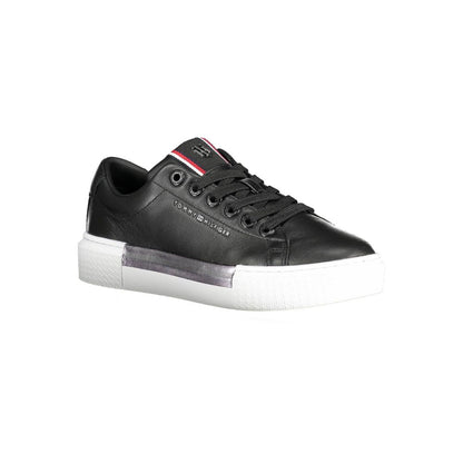 Tommy Hilfiger Black Leather Women Sneaker with white sole, showcasing sporty chic design and iconic logo detailing.