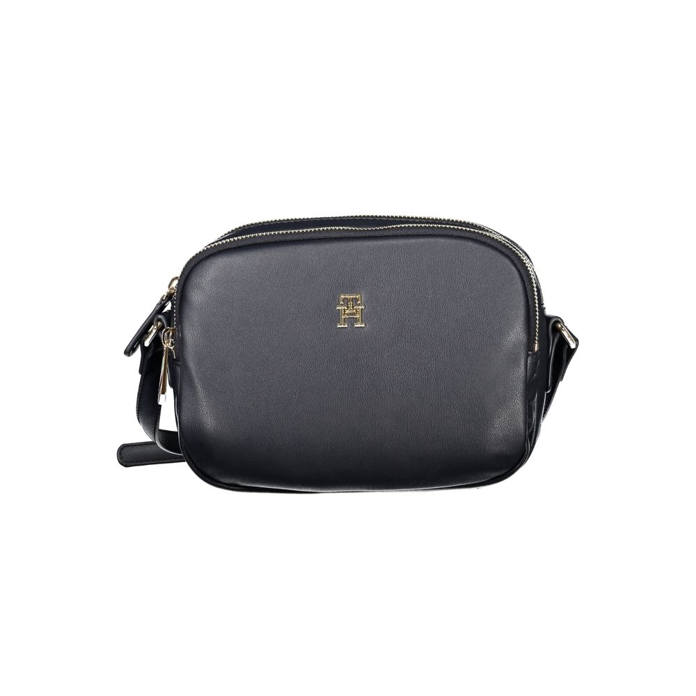 Tommy Hilfiger Blue Polyester Handbag with adjustable shoulder strap, zip closure, and logo design, featuring two compartments and an internal pocket.