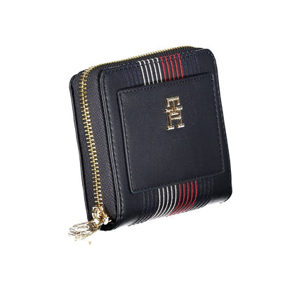 Tommy Hilfiger Blue Polyethylene Wallet with zip closure, logo, external pocket, and compartments for cards and coins.