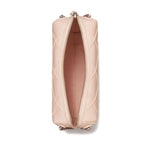 Top view of a Tory Burch Fleming leather crossbody bag in light pink with diamond quilted design and zip closure.