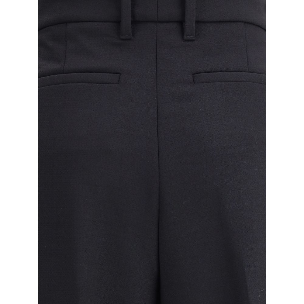 Close-up of True Royal Black Wool Casual Pants with side welt pockets and belt loops.