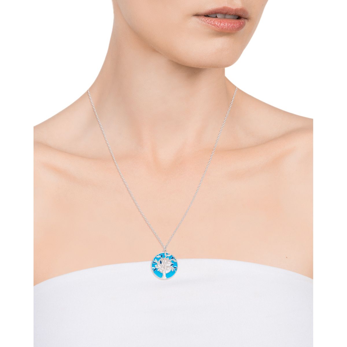 Lady wearing VICEROY JEWELS Mod. 13012C000-13 necklace in silver 925°, featuring a round pendant with a turquoise design.