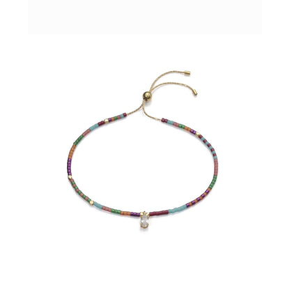 Multi-colored beaded bracelet with adjustable clasp and charm detail on white background.
