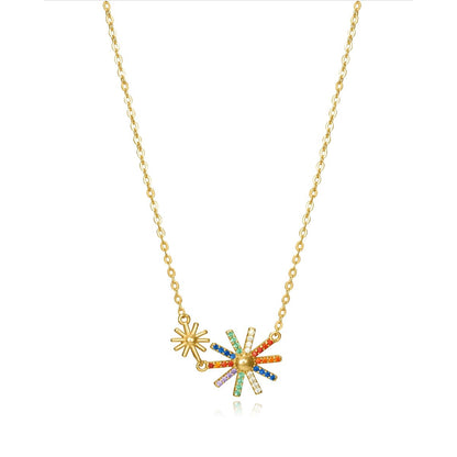 Colorful daisy charm necklace with gold chain featuring multi-colored gemstones and floral design.