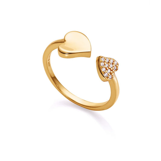 Elegant gold ring with heart-shaped ends, one adorned with crystals, designed for women. Stylish accessory for any occasion.
