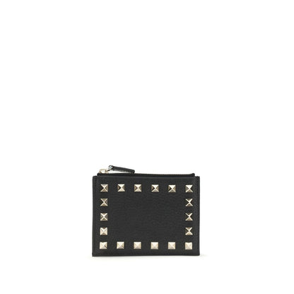Valentino Garavani Black Calf Leather Bos Taurus Wallet with studs and zippered coin compartment, stylish accessory for everyday use.