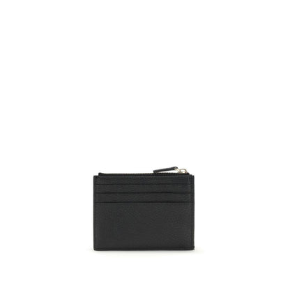 Valentino Garavani Black Calf Leather Bos Taurus Wallet with Rockstud details, featuring card slots and zippered coin compartment.