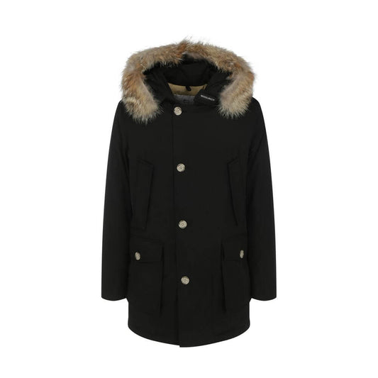 Woolrich Black Cotton Parka with fur hood, padded design, and front closure featuring zip and buttons, AW25 season.