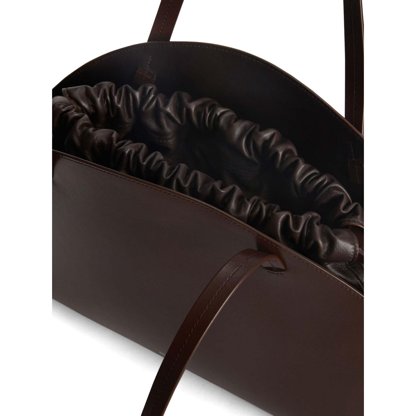 Front view with bag zipped and handles upright.