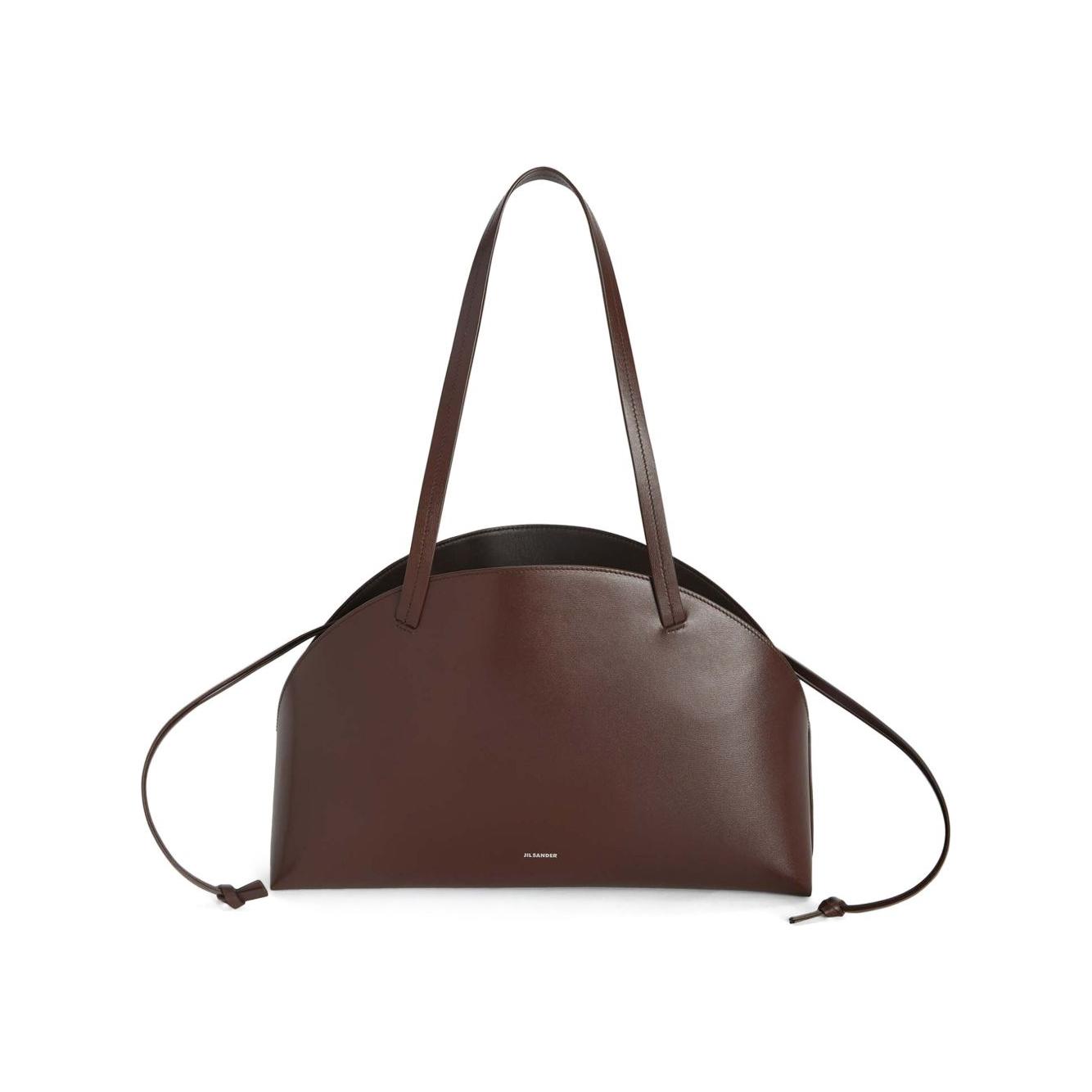 Front view with bag zipped and handles upright.
